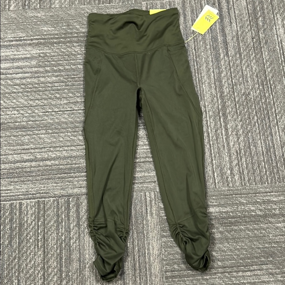 Green leggings